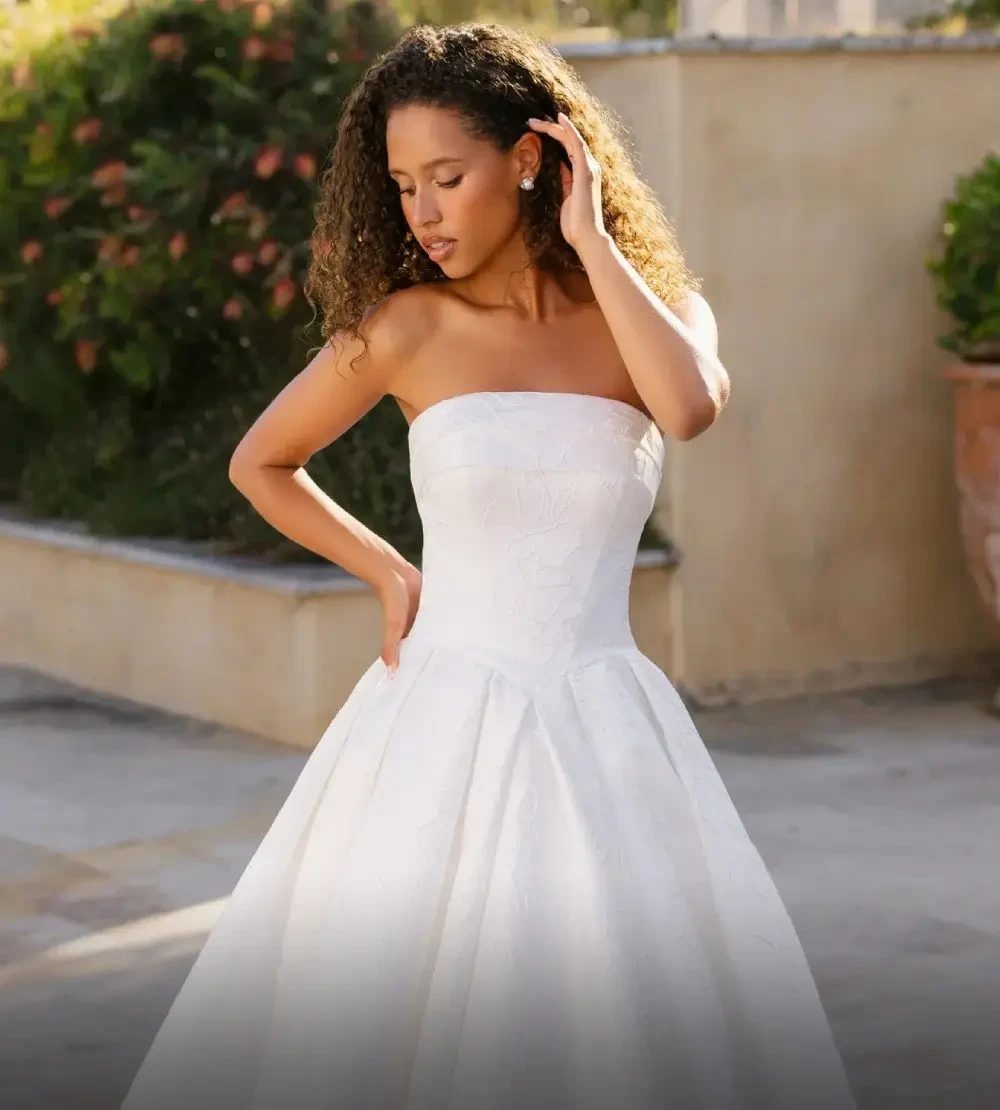 Model wearing a Allure gown